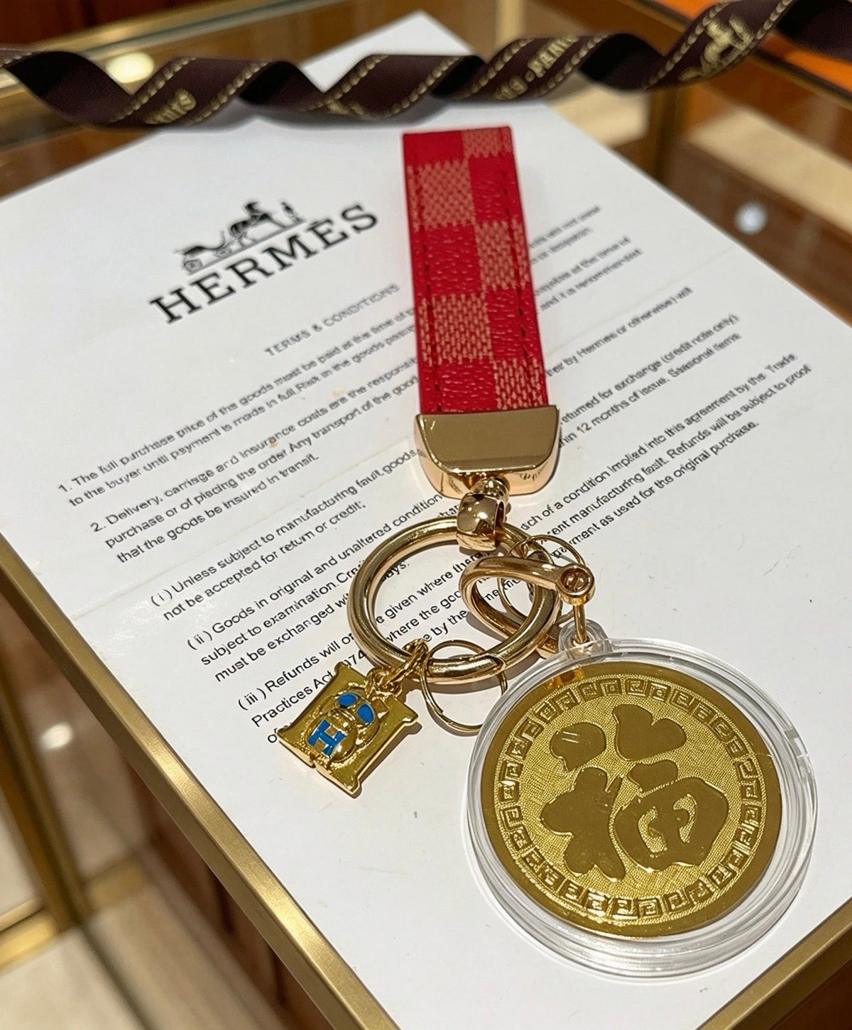 Martin Graham keychain in polished metal-tone – detail view