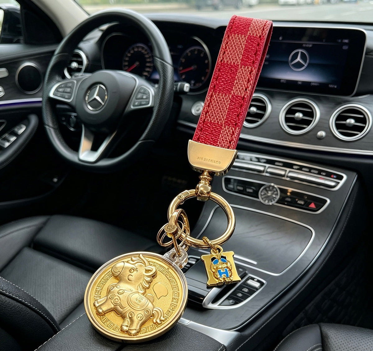Martin Graham keychain in polished metal-tone – detail view