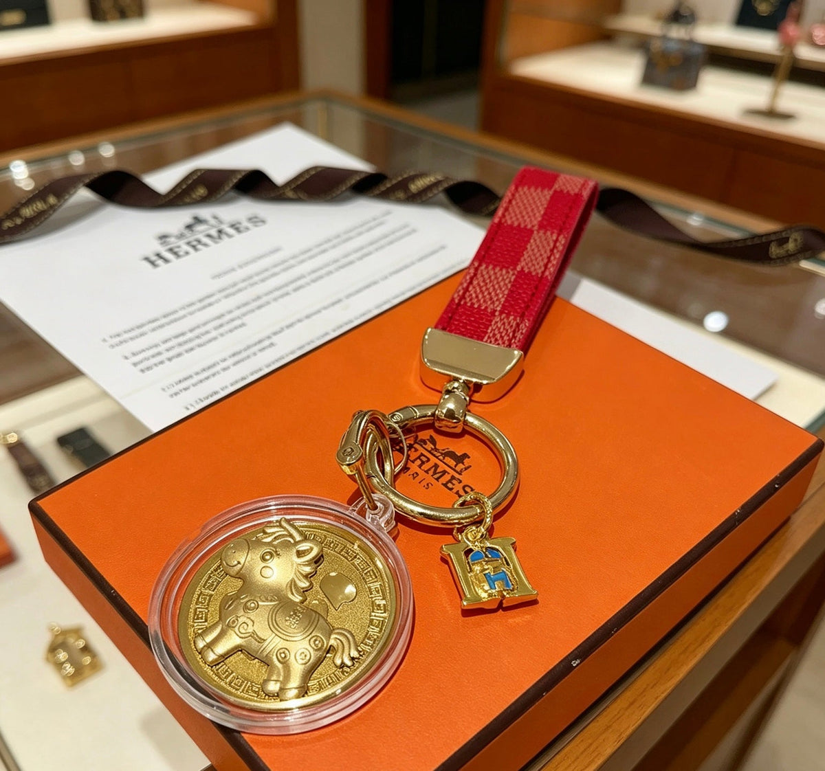 Martin Graham keychain in polished metal-tone – close-up detail