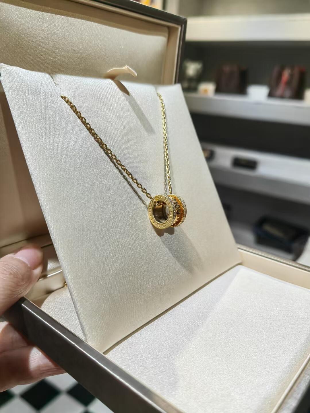 Martin Graham pendant necklace in polished metal-tone – front product view