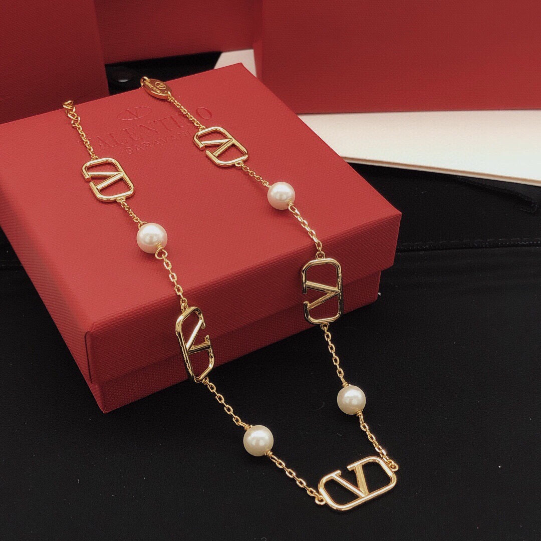 Martin Graham pendant necklace in polished metal-tone