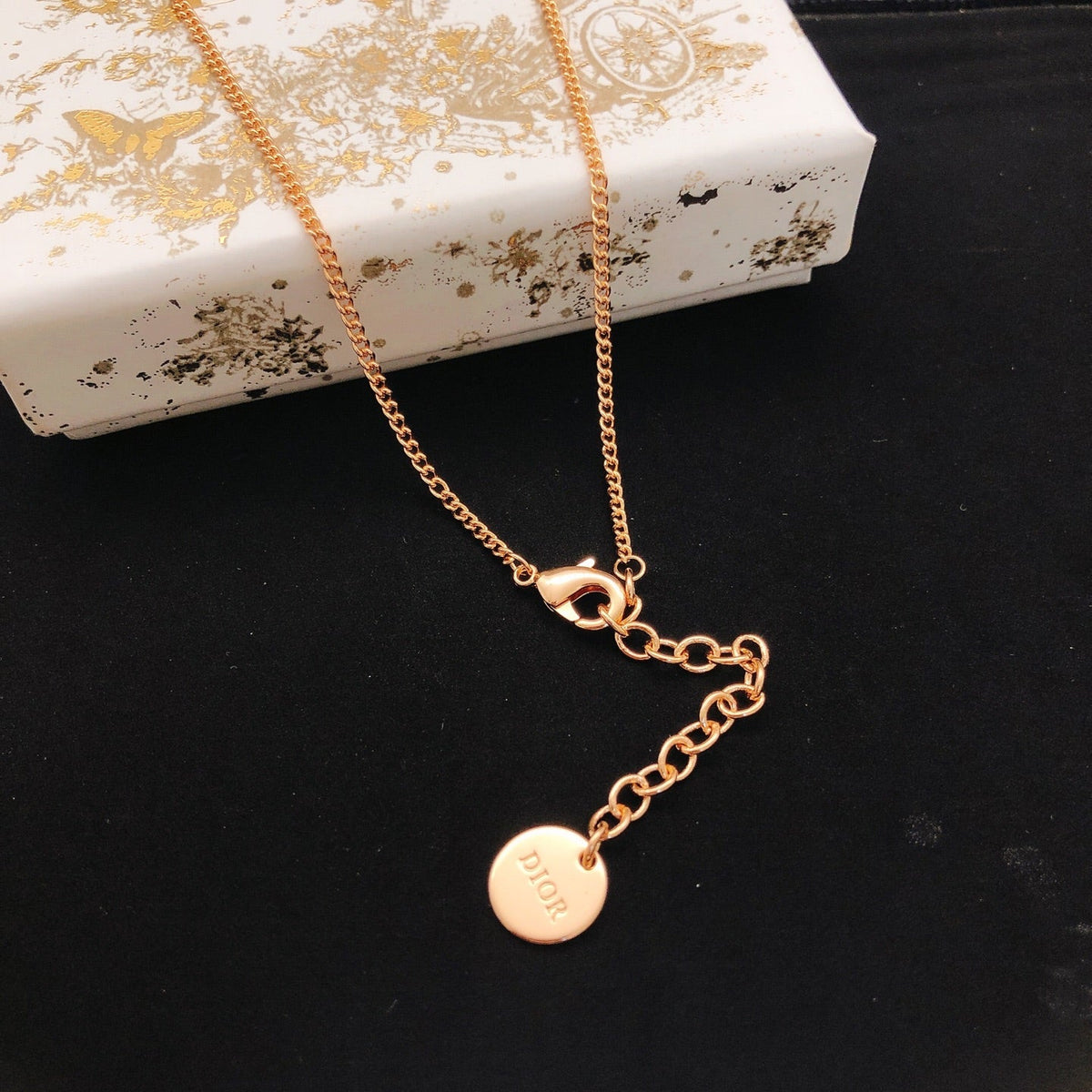 Martin Graham pendant necklace in polished metal-tone – front view