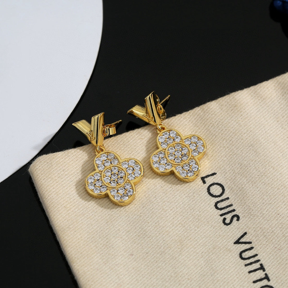 Martin Graham stud earrings in polished metal-tone – side detail