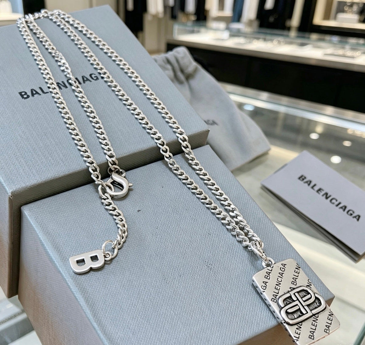 Martin Graham pendant necklace in polished metal-tone – front product view