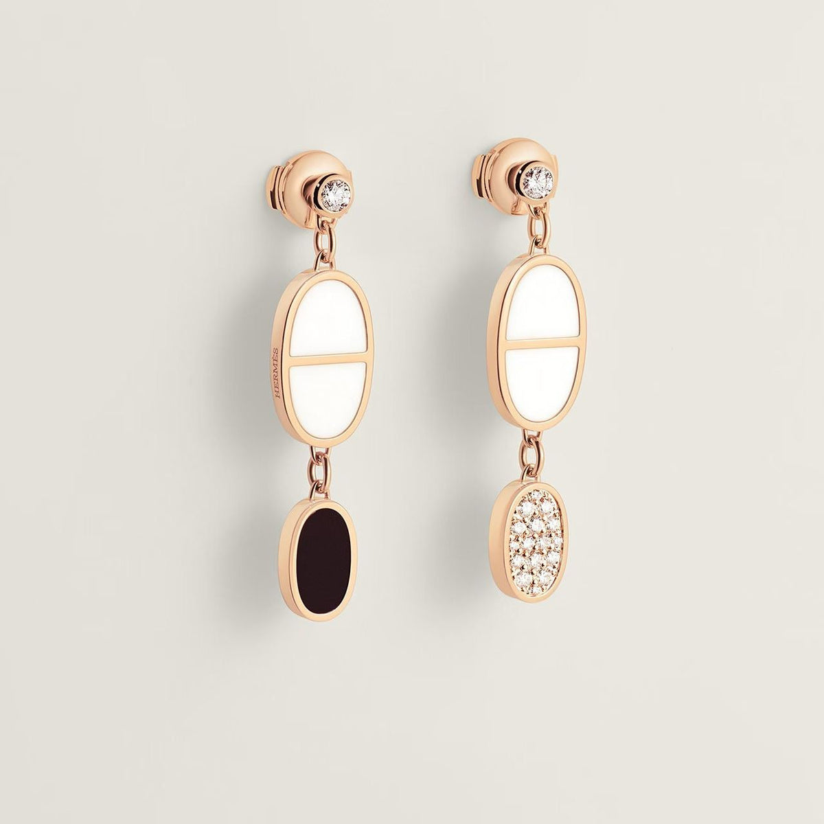 Martin Graham stud earrings in polished metal-tone – side detail