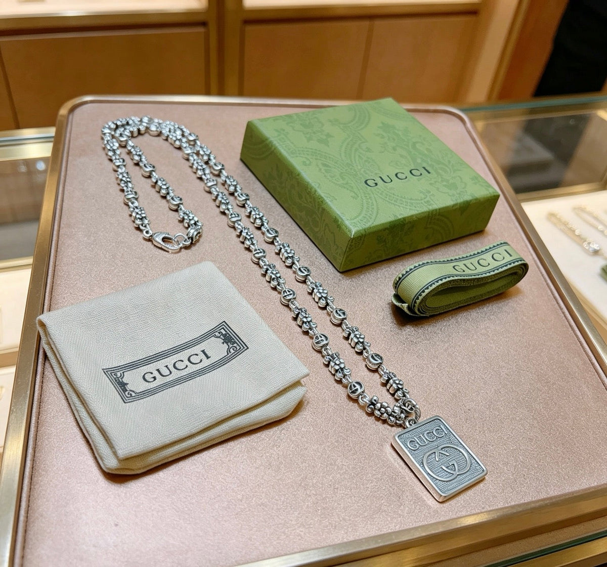 Martin Graham pendant necklace in polished metal-tone – front product view