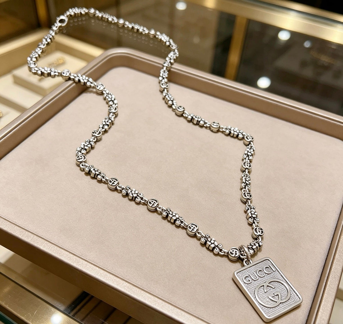 Martin Graham pendant necklace in polished metal-tone – front product view