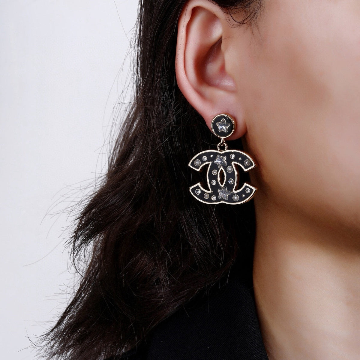 Martin Graham earrings in polished metal-tone – front product view