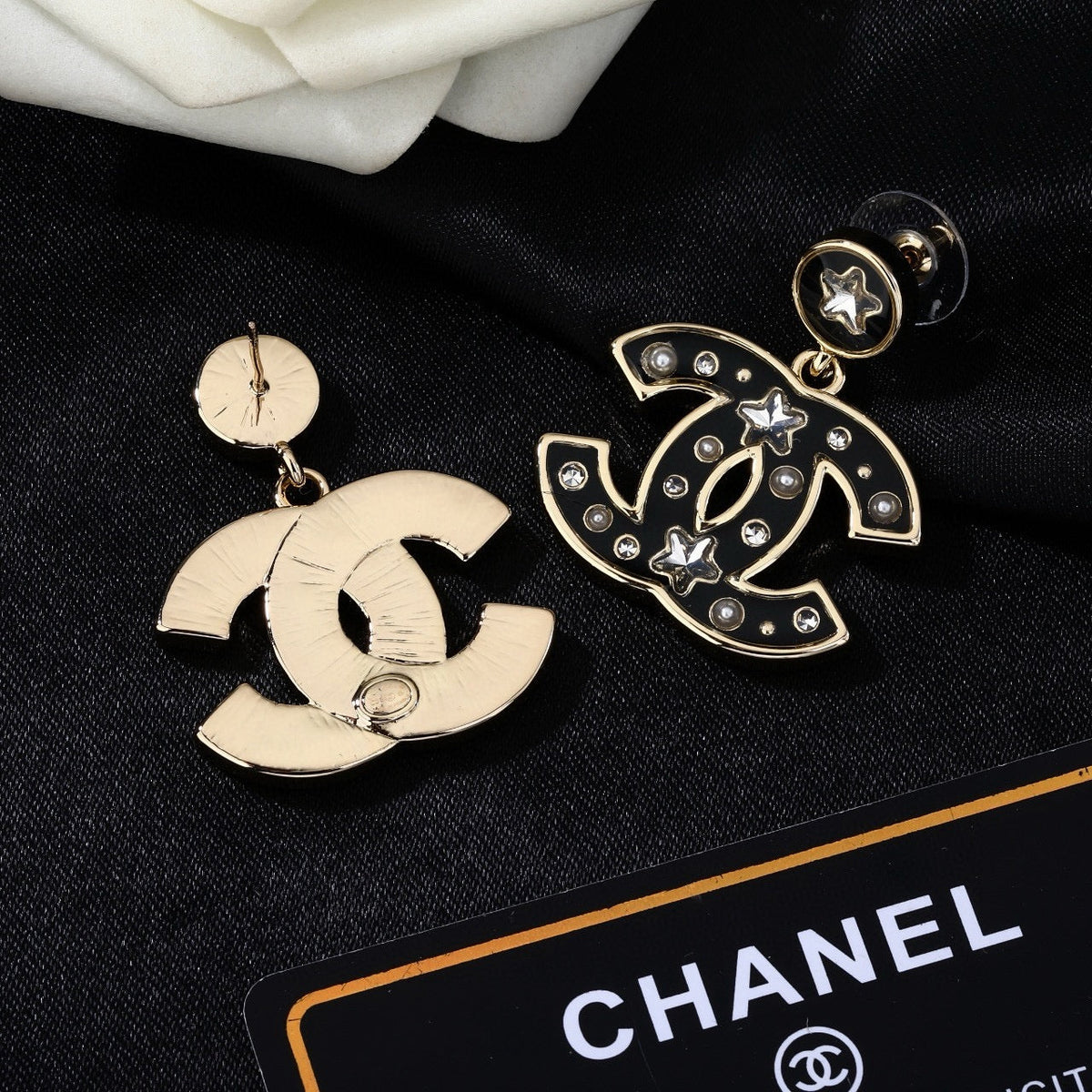 Martin Graham earrings in polished metal-tone – close-up detail