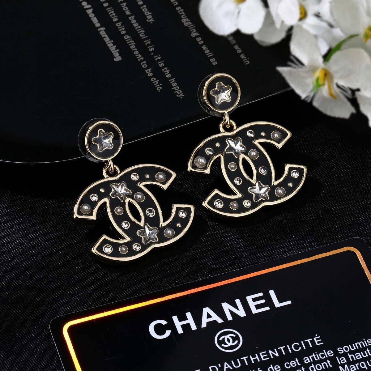 Martin Graham earrings in polished metal-tone – front product view