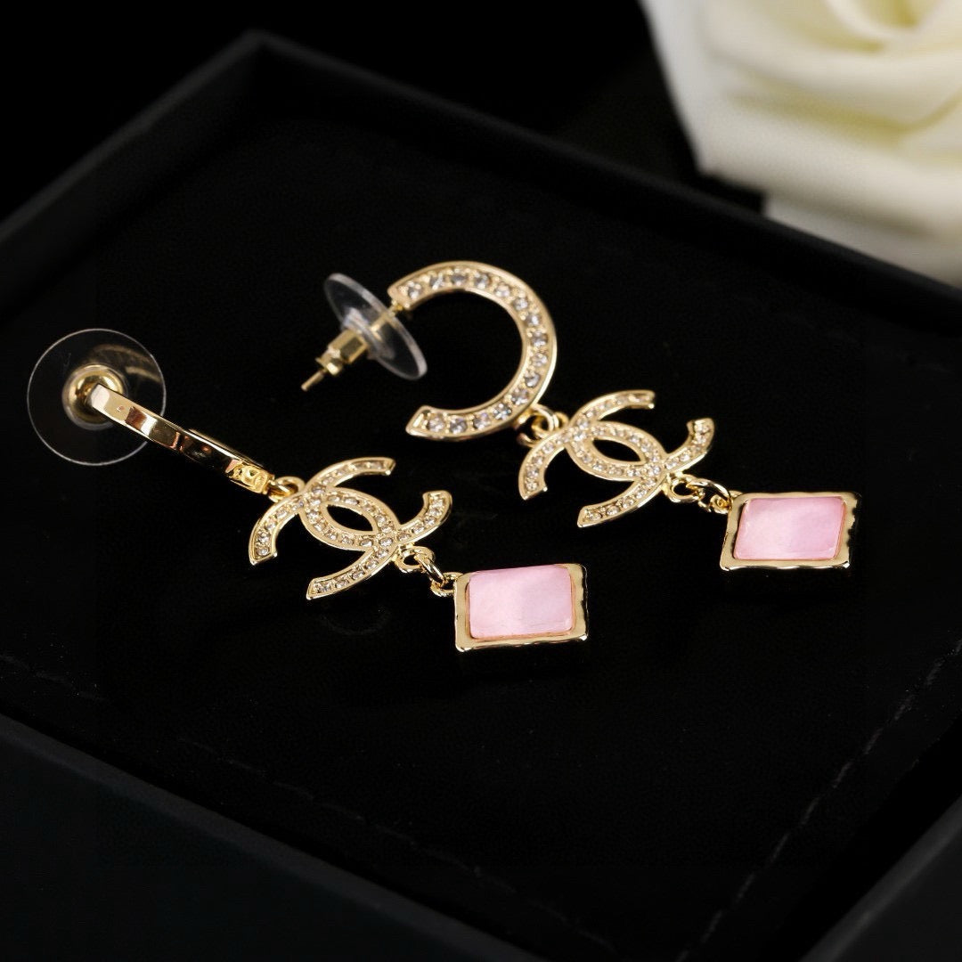 Martin Graham Double-C earrings in gold-tone – styled product view