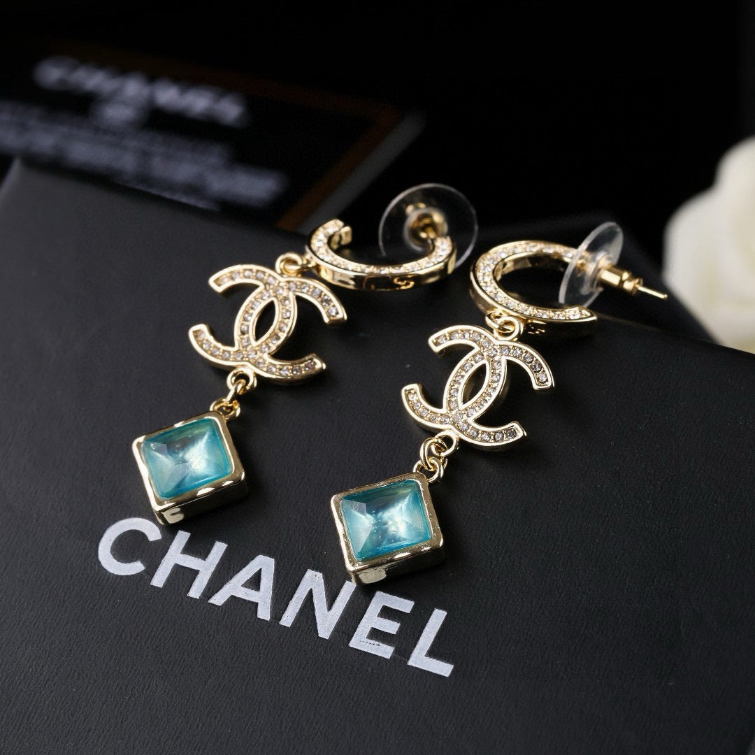 Martin Graham Double-C earrings in gold-tone – side detail
