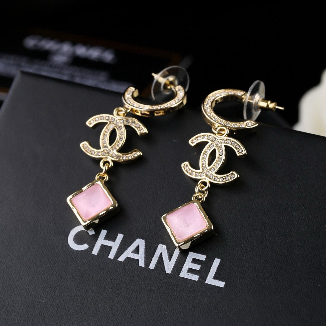 Martin Graham Double-C earrings in gold-tone – detail view