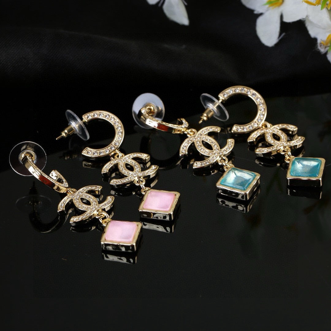 Martin Graham Double-C earrings in gold-tone – front product view