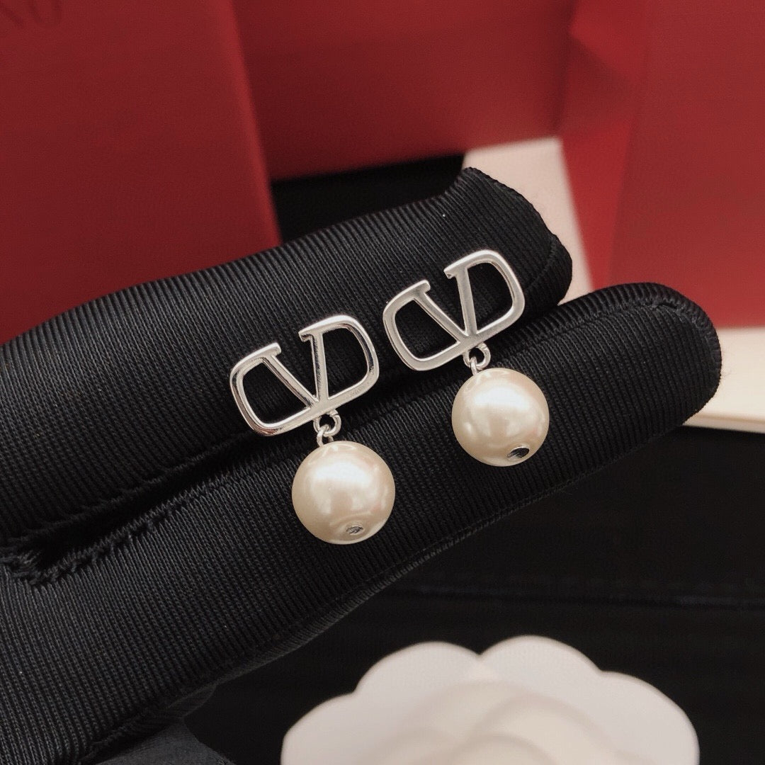Martin Graham stud earrings in polished metal-tone – main product view