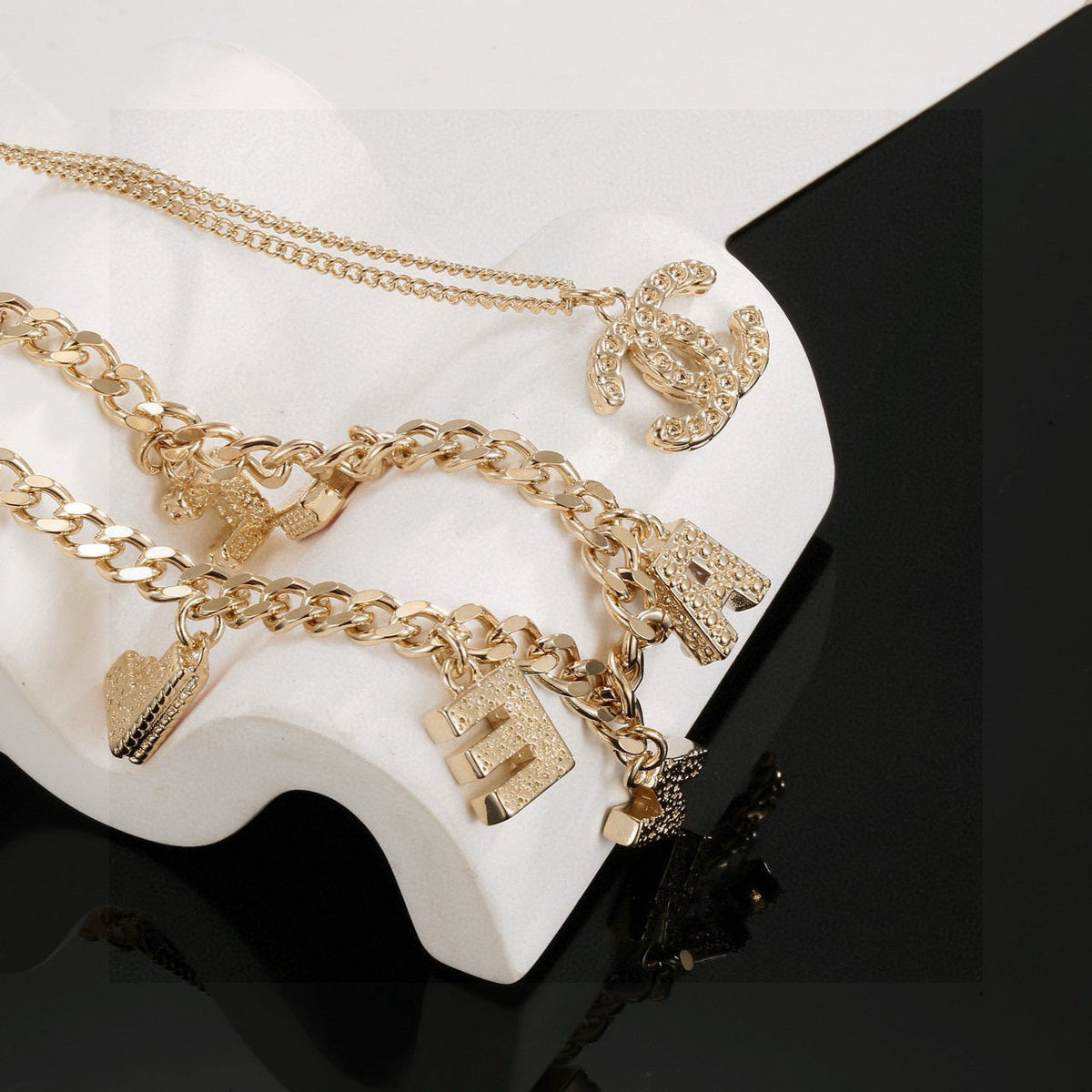 Martin Graham pendant necklace in polished metal-tone – main product view