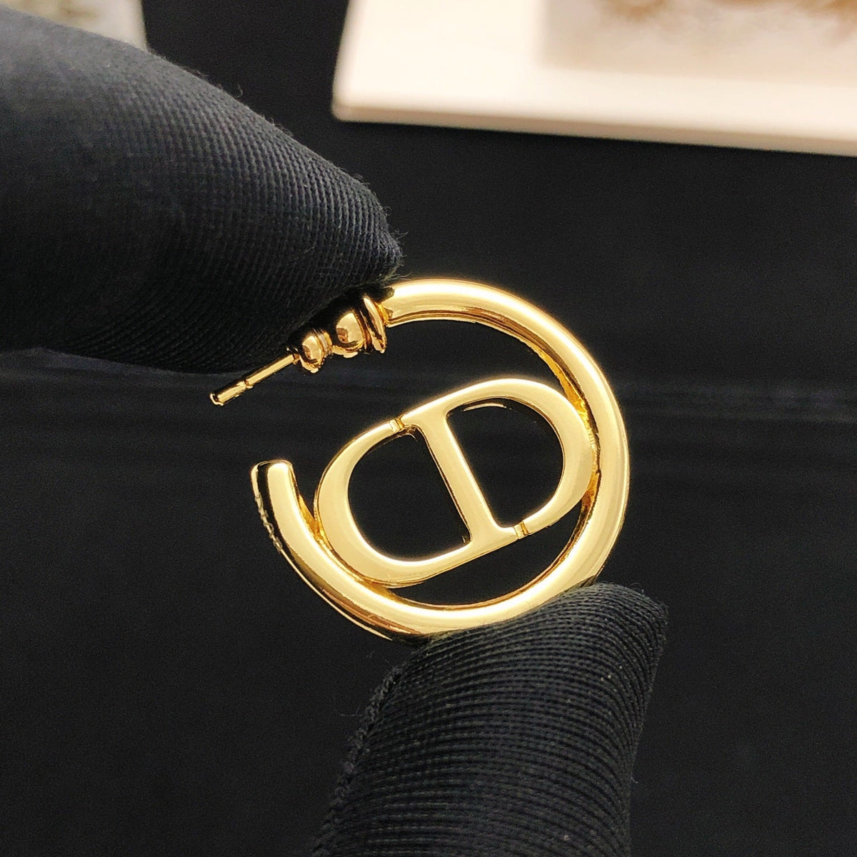 Martin Graham earrings in polished metal-tone – front view