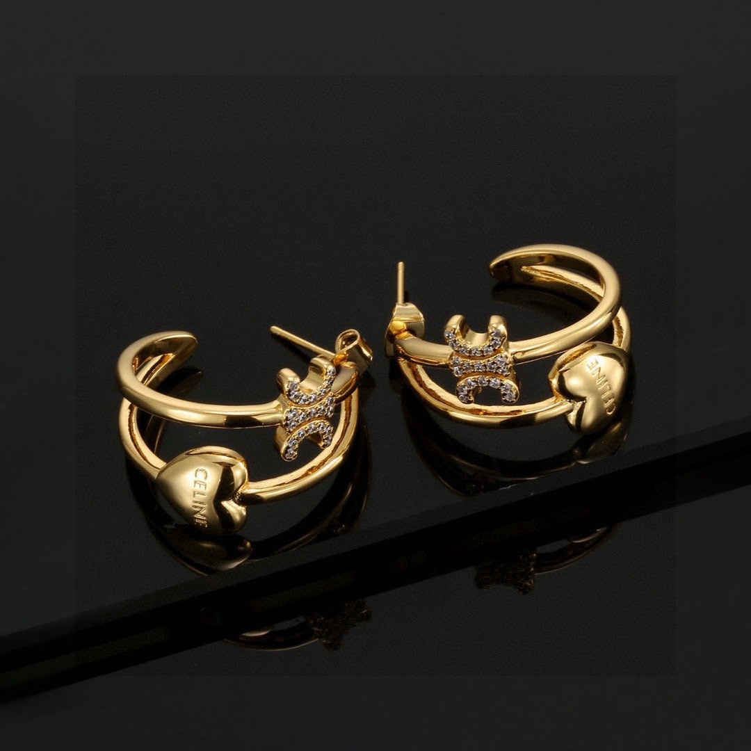 Martin Graham stud earrings in polished metal-tone – side detail