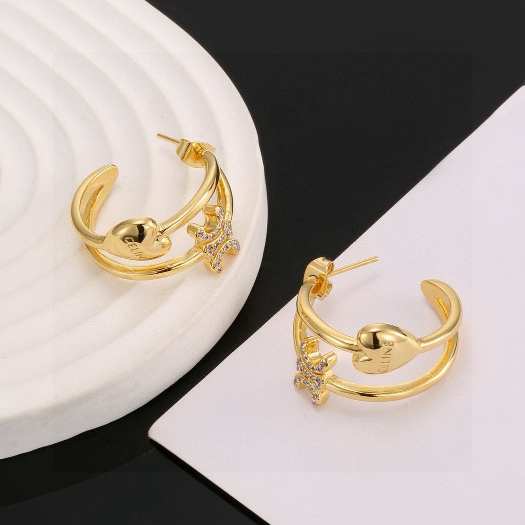 Martin Graham stud earrings in polished metal-tone