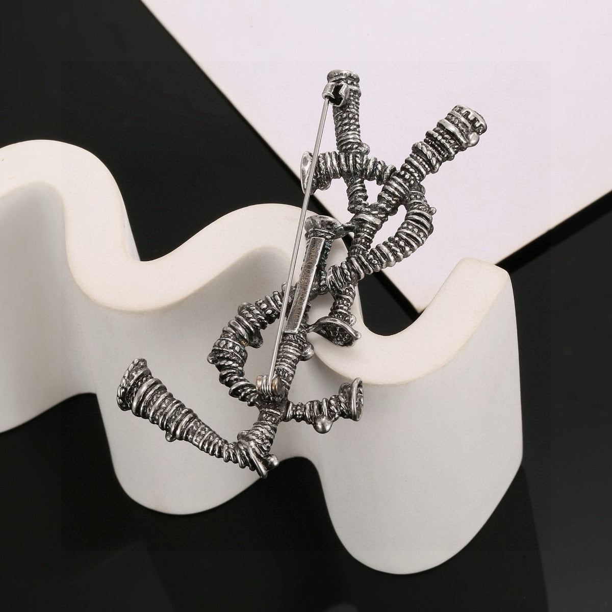 Martin Graham brooch in polished metal-tone – detail view