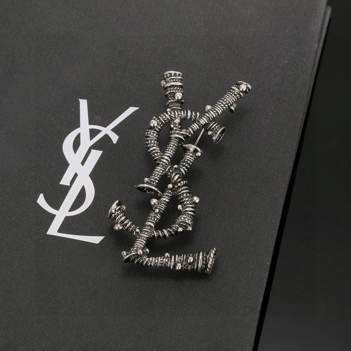 Martin Graham brooch in polished metal-tone – close-up detail