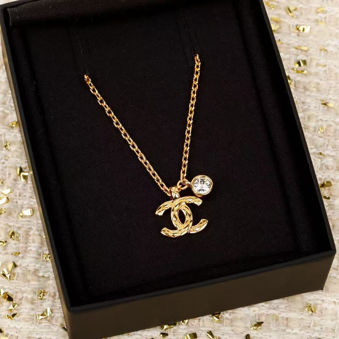 Martin Graham pendant necklace in polished metal-tone – front product view