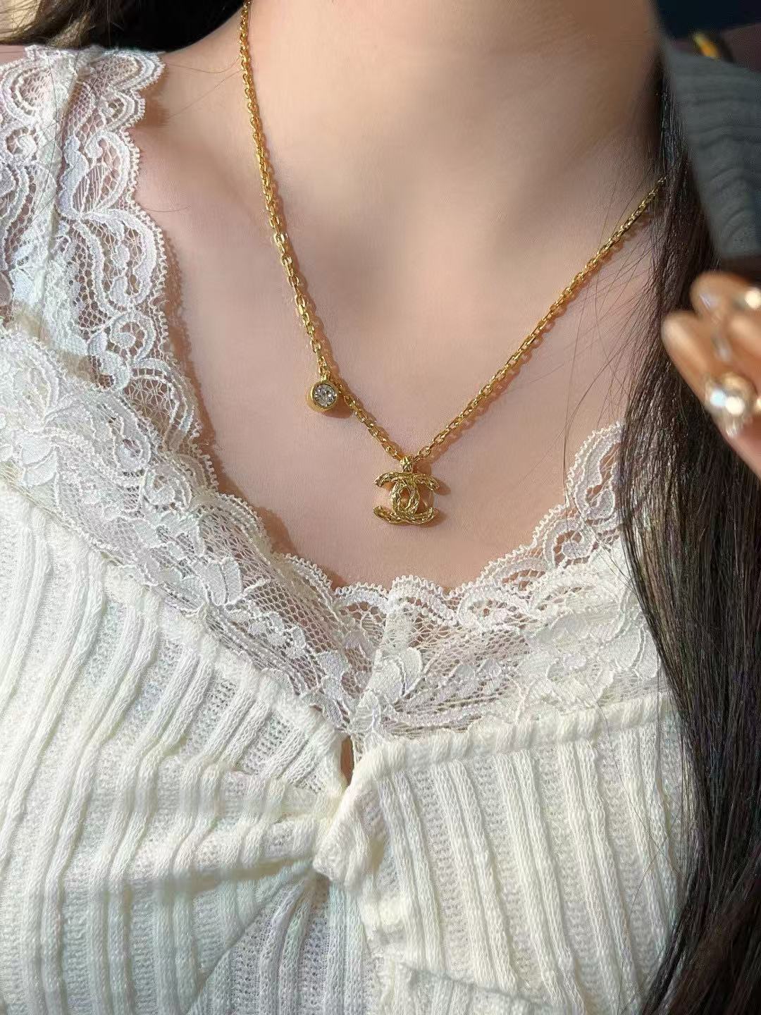 Martin Graham pendant necklace in polished metal-tone – main product view