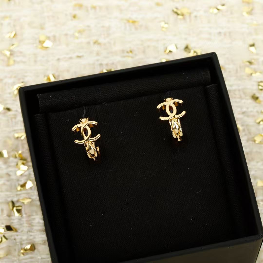 Martin Graham stud earrings in polished metal-tone – side detail