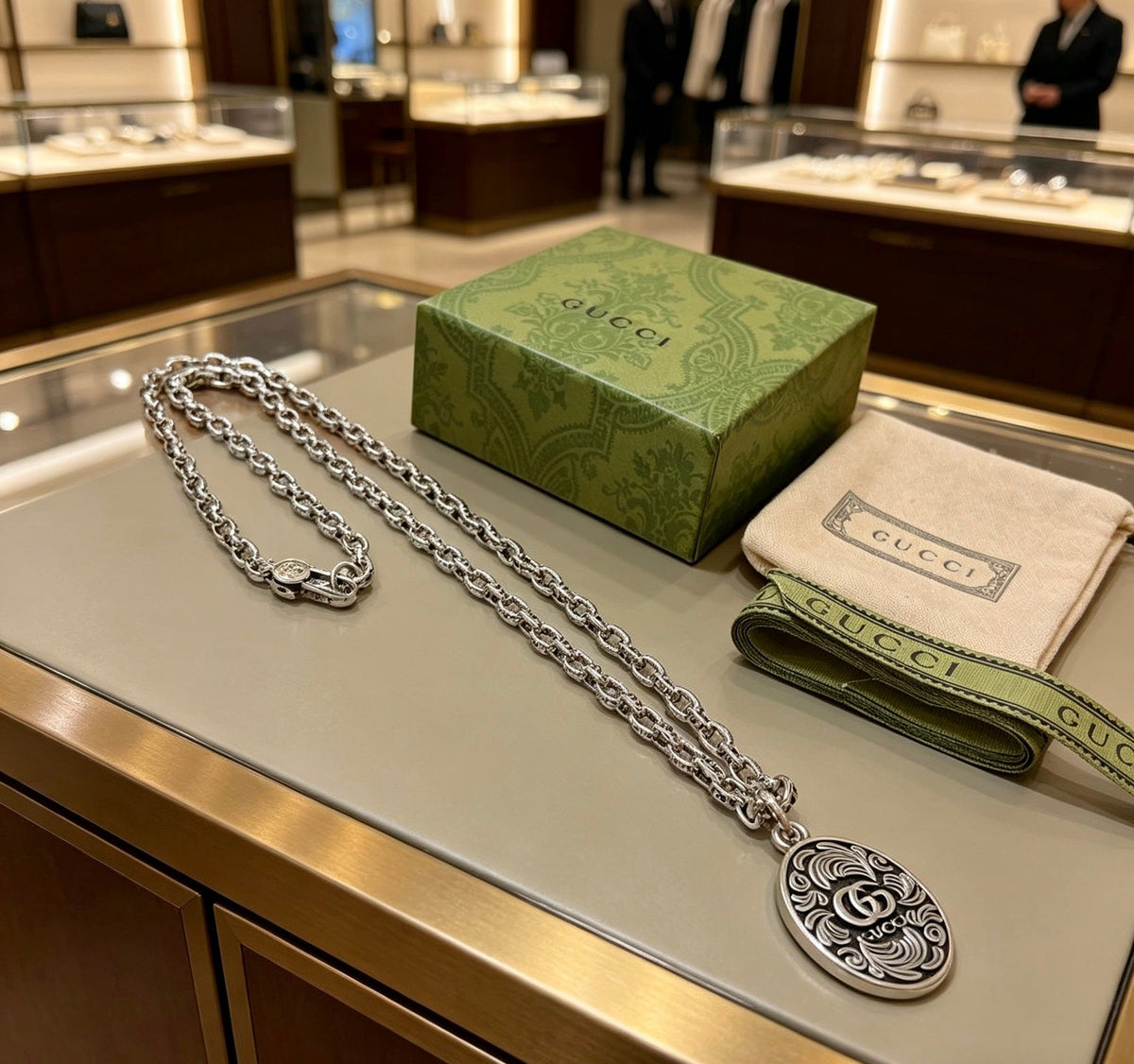 Martin Graham pendant necklace in polished metal-tone – front product view