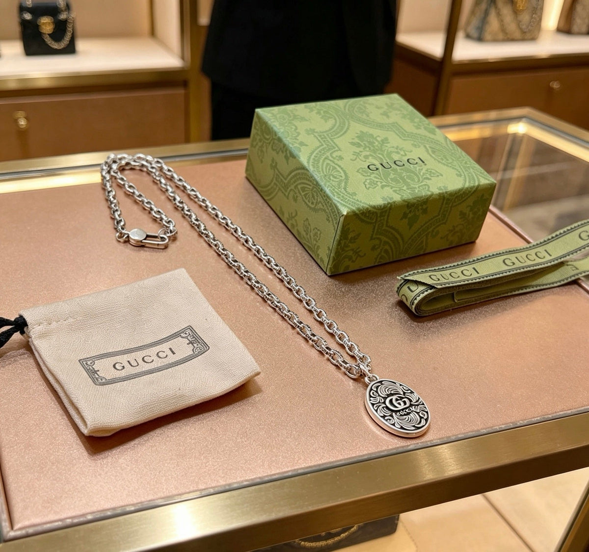 Martin Graham pendant necklace in polished metal-tone – front product view