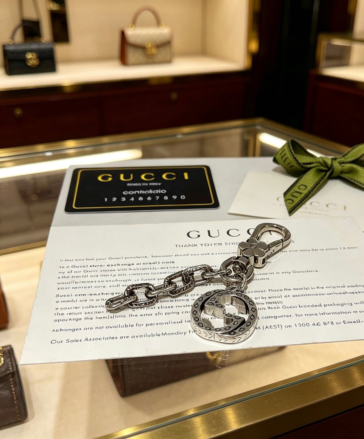 Martin Graham keychain in polished metal-tone – detail view