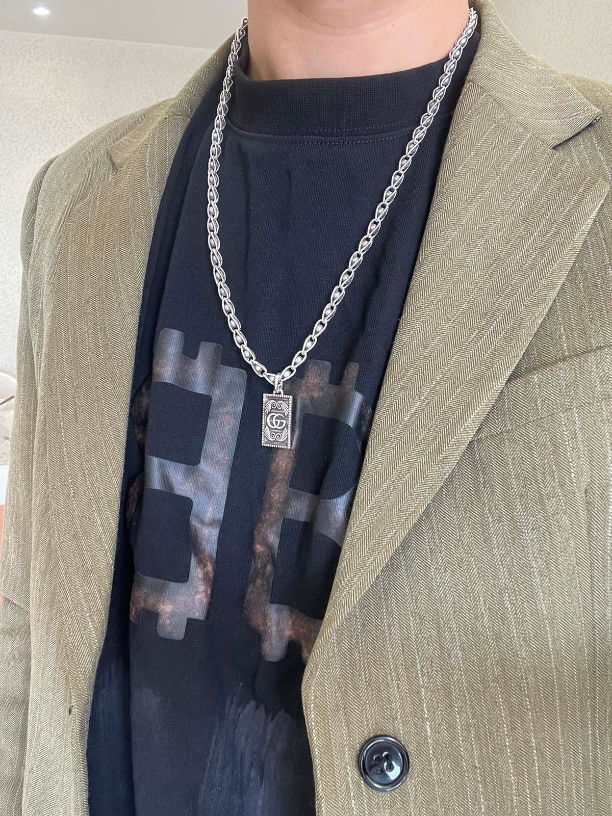 Martin Graham pendant necklace in polished metal-tone – styled product view