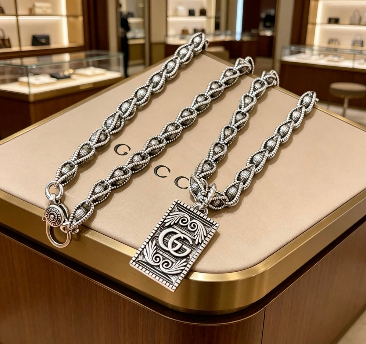 Martin Graham pendant necklace in polished metal-tone – front product view
