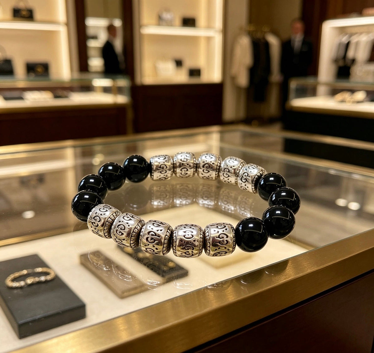 Martin Graham bracelet in polished metal-tone – close-up detail
