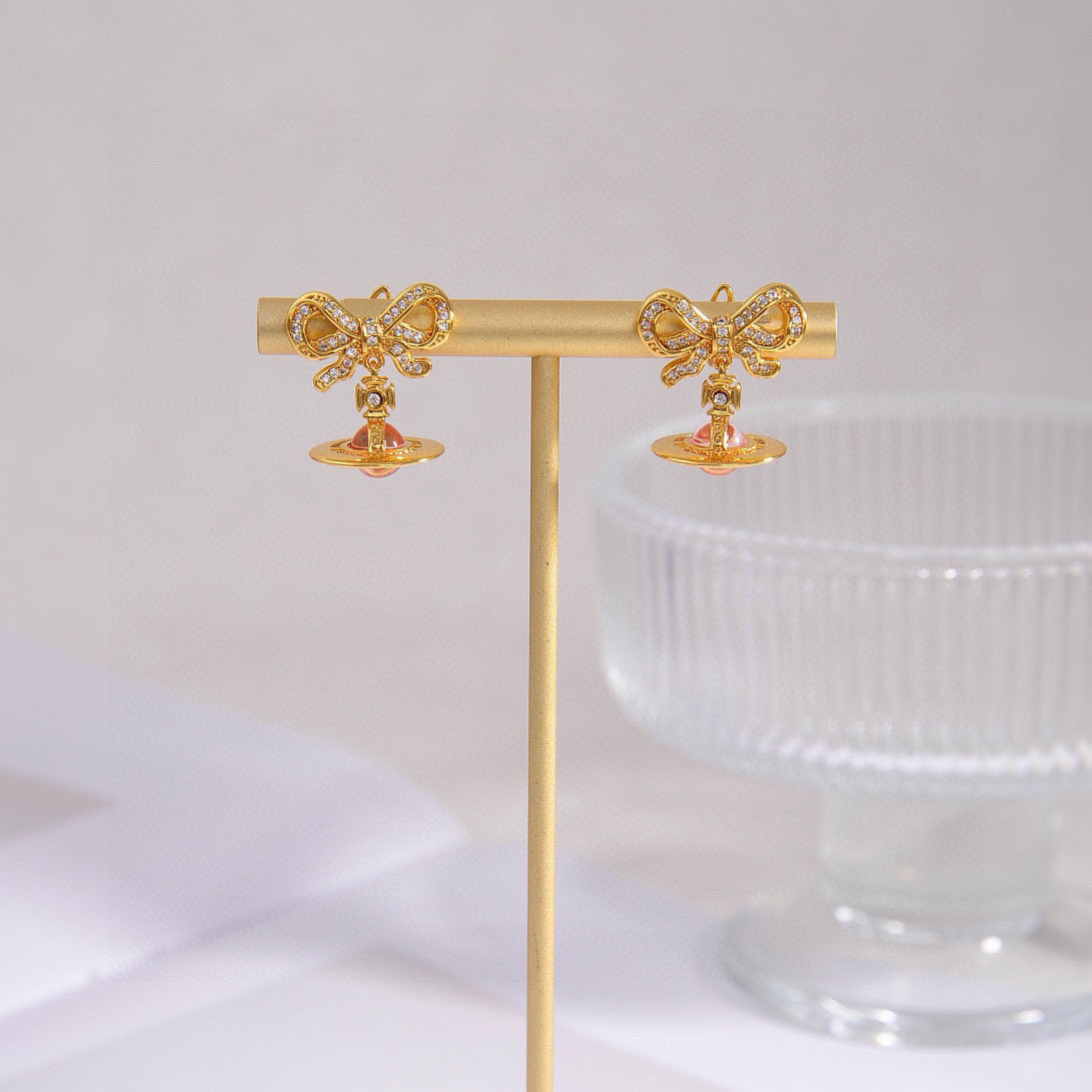 Martin Graham stud earrings in polished metal-tone – detail view