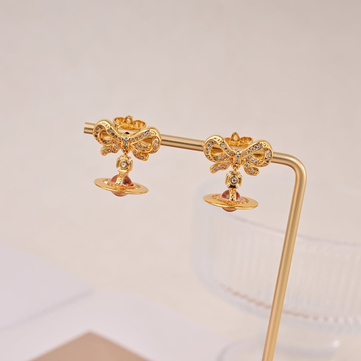 Martin Graham stud earrings in polished metal-tone – front product view