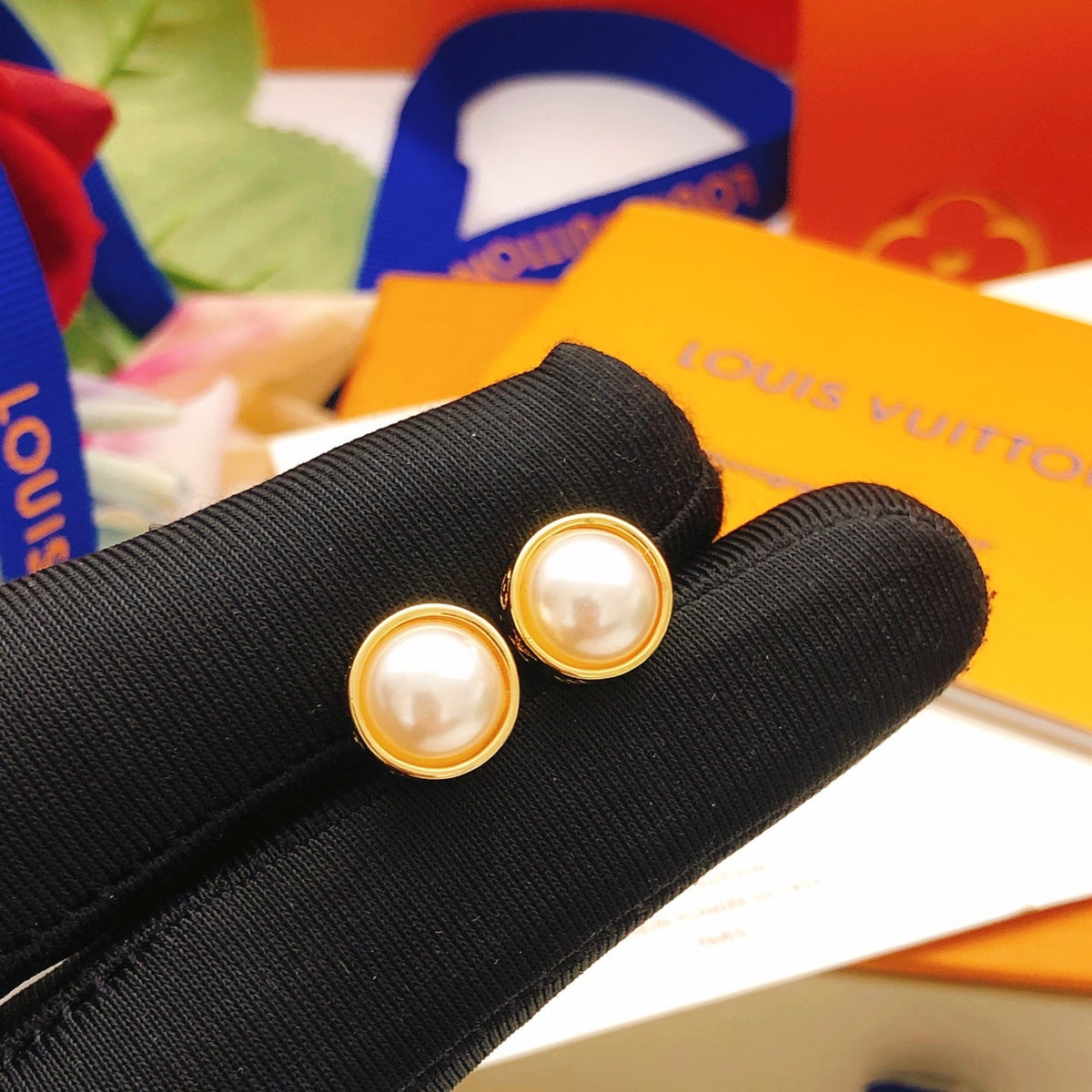 Martin Graham stud earrings in polished metal-tone – side detail