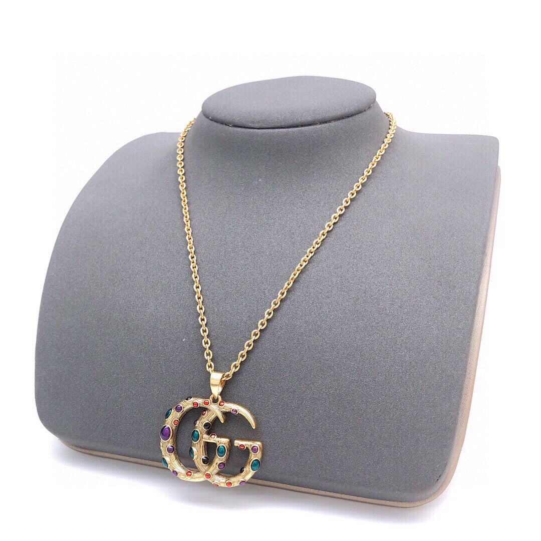 Martin Graham pendant necklace in polished metal-tone – front product view