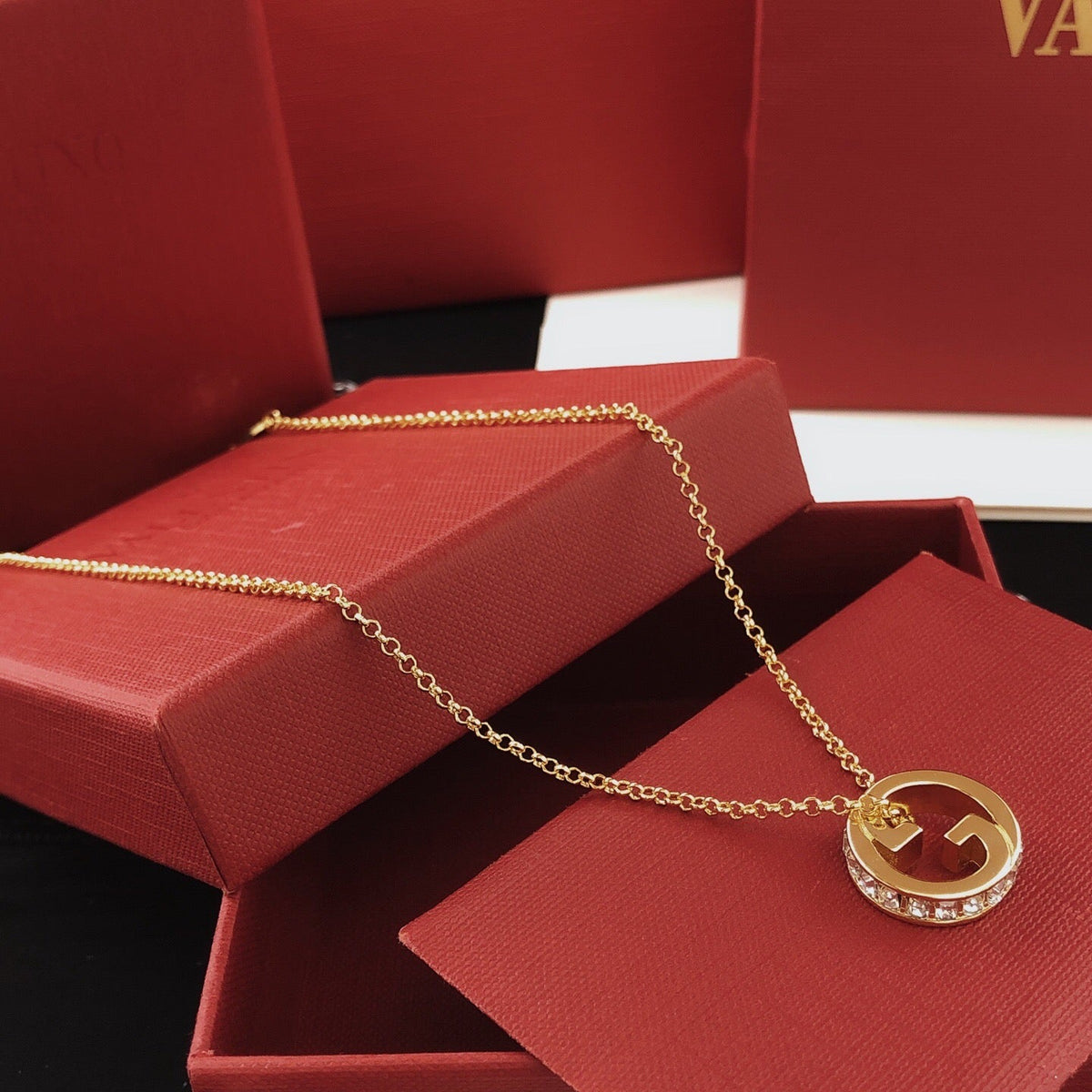Martin Graham pendant necklace in polished metal-tone – front product view