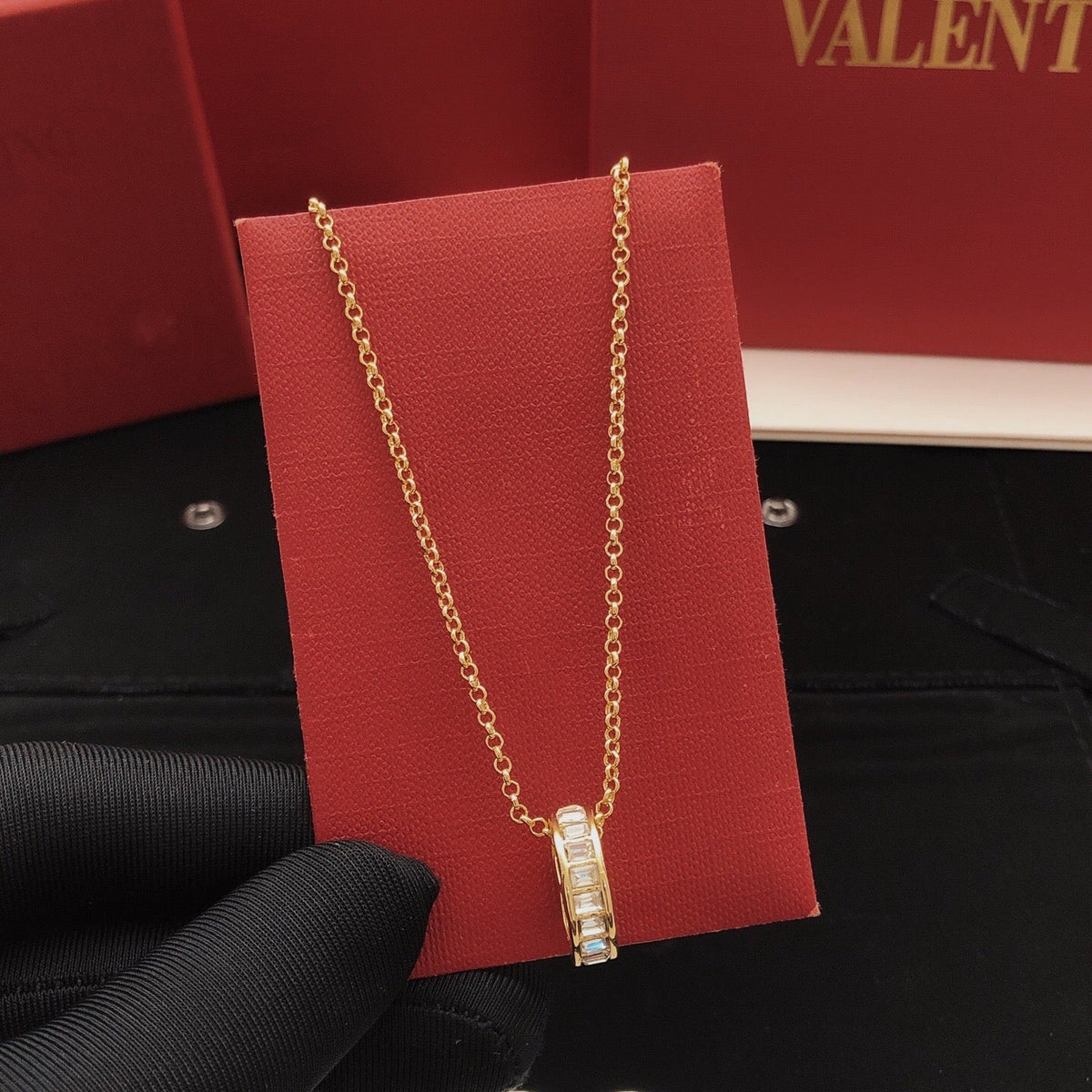Martin Graham pendant necklace in polished metal-tone – detail view
