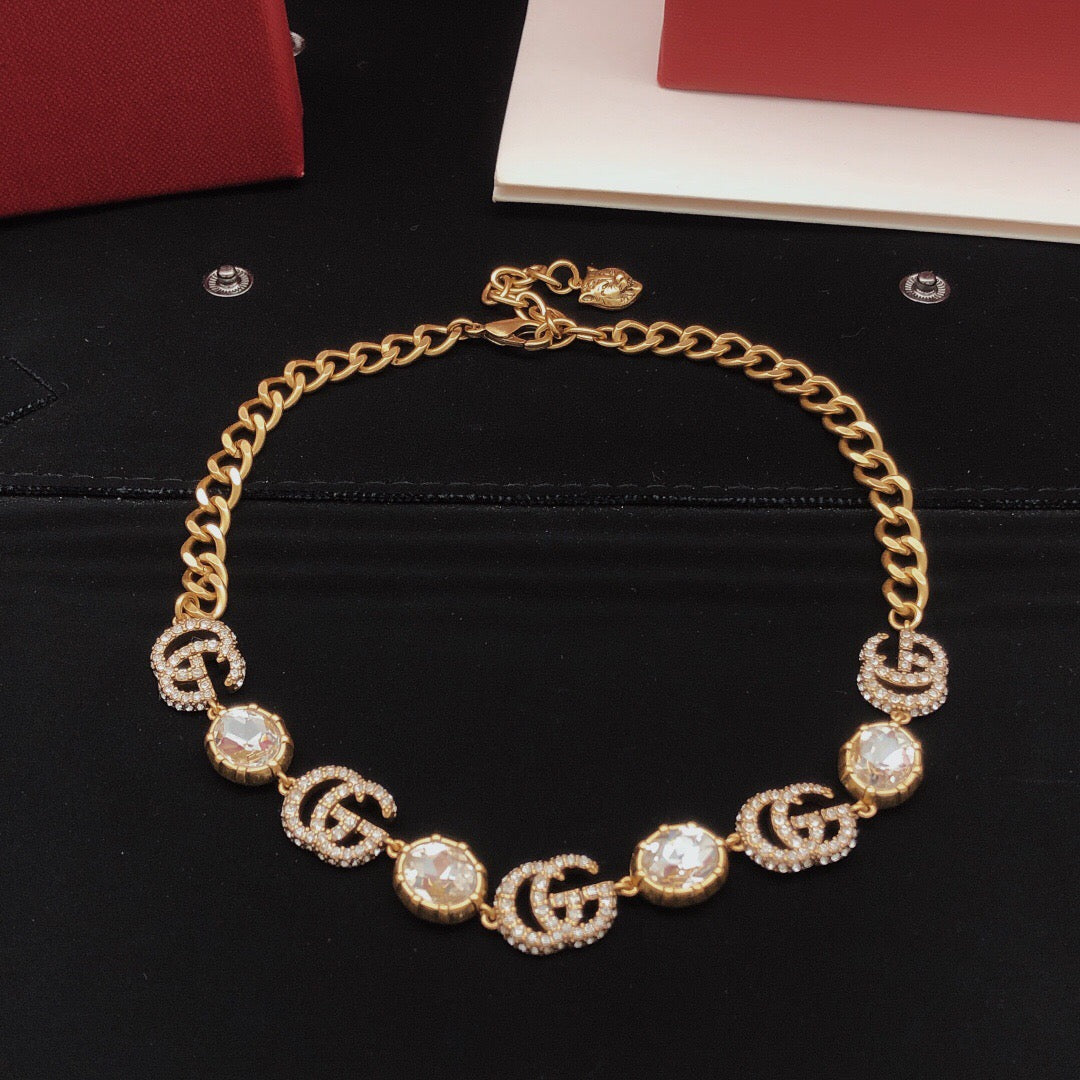 Martin Graham pendant necklace in polished metal-tone – detail view