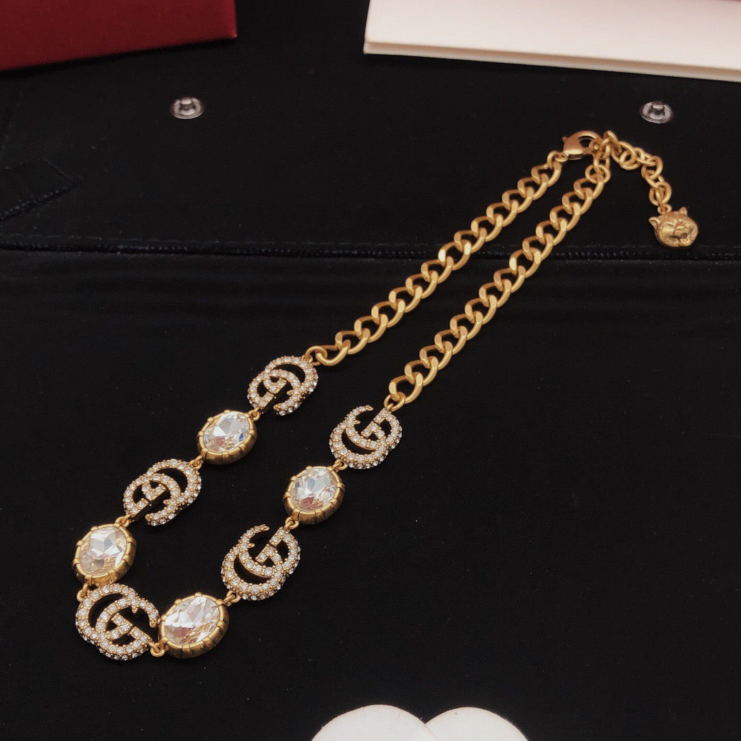 Martin Graham pendant necklace in polished metal-tone – front product view