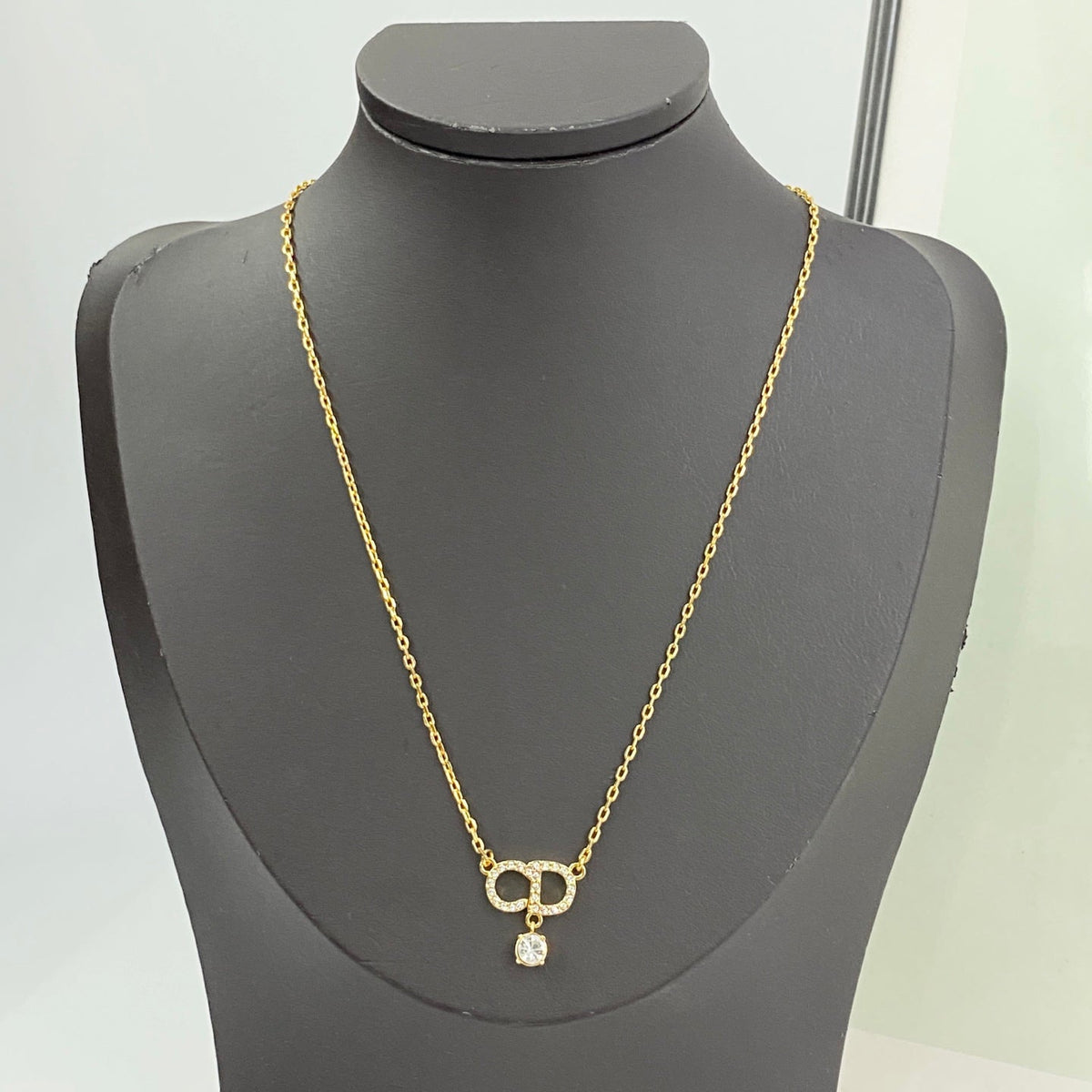 Martin Graham pendant necklace in polished metal-tone – main product view