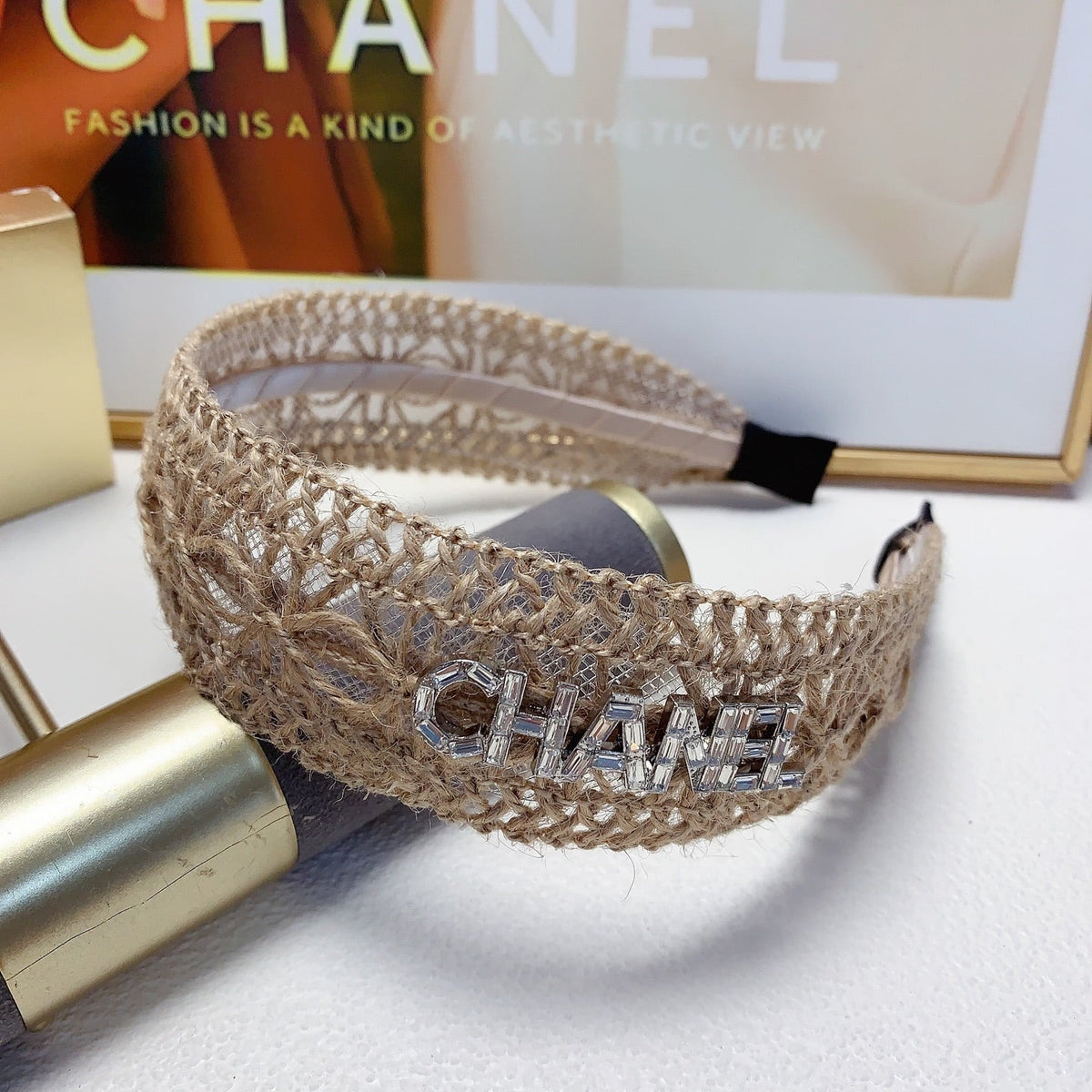 Martin Graham hair accessory in polished metal-tone – close-up detail