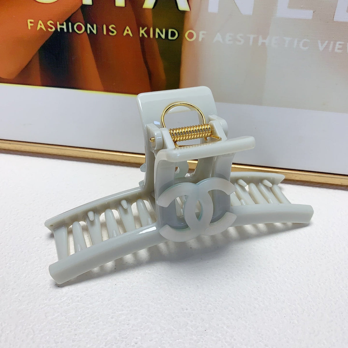 Martin Graham hair accessory in polished metal-tone – front product view