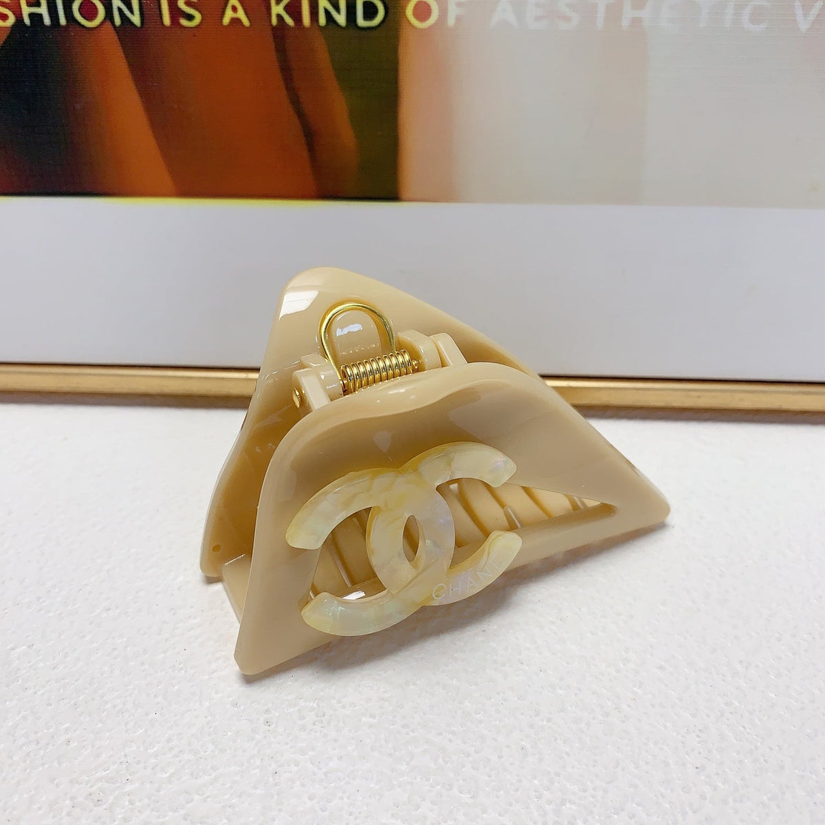 Martin Graham hair accessory in polished metal-tone – styled product view