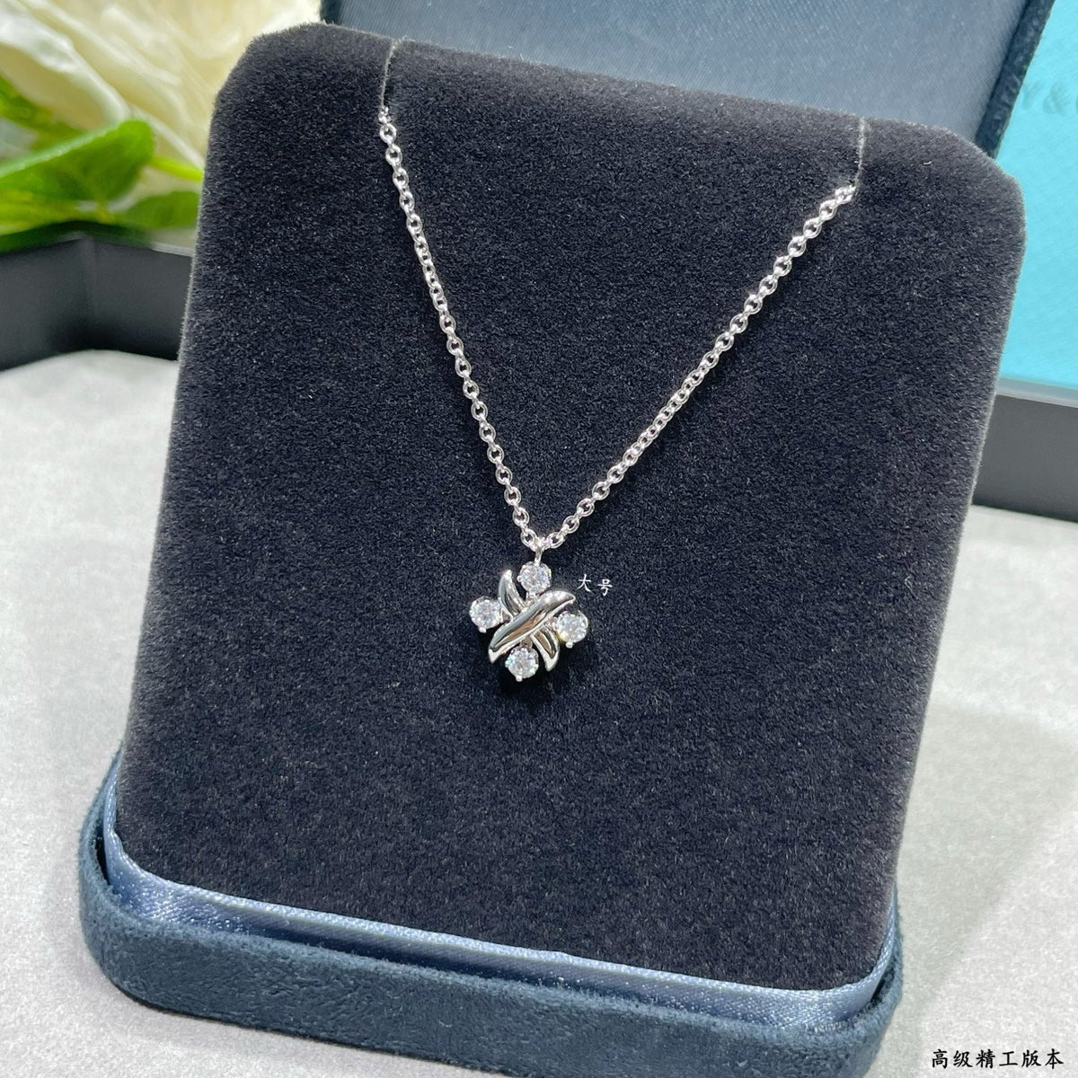 Martin Graham pendant necklace in polished metal-tone – detail view