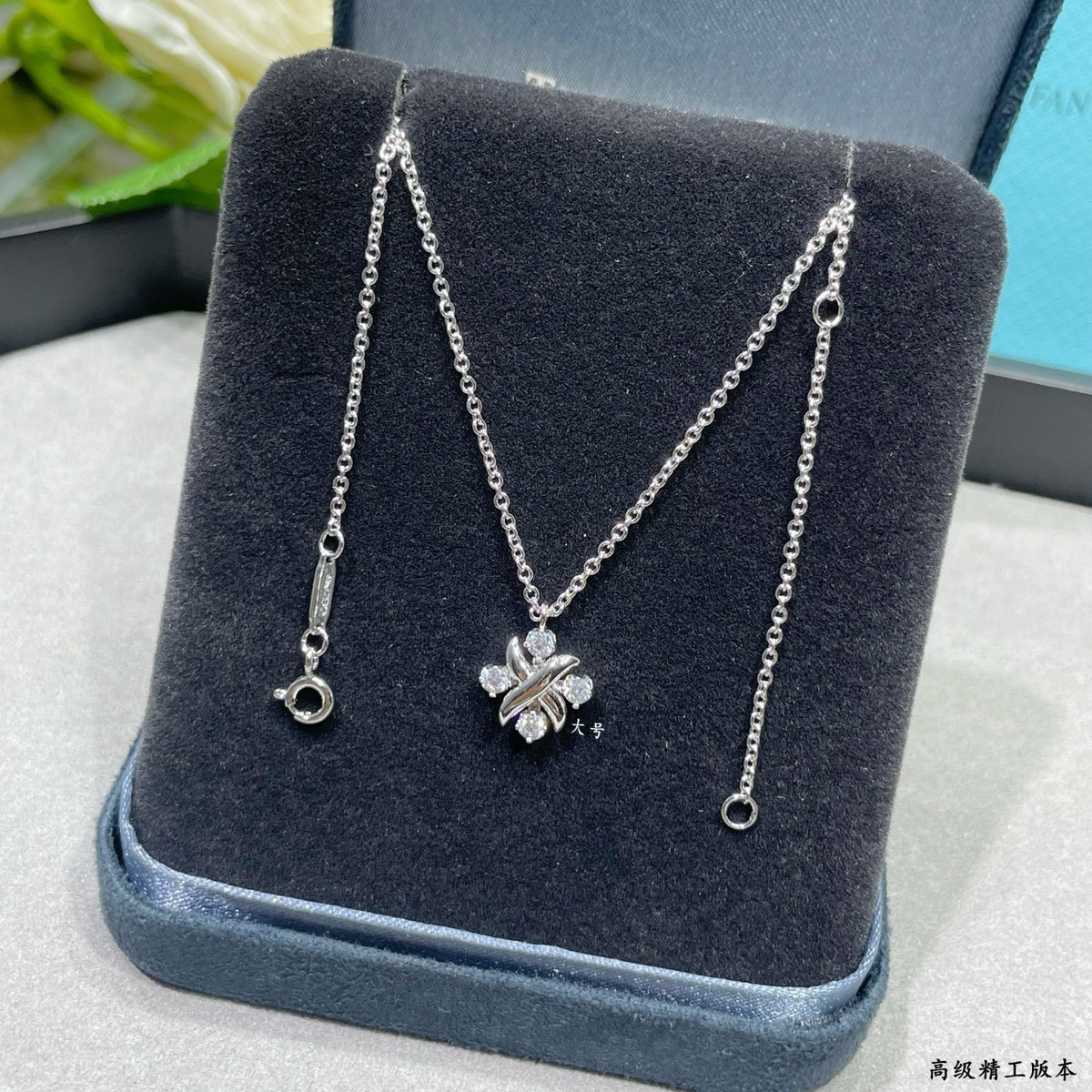 Martin Graham pendant necklace in polished metal-tone – close-up detail