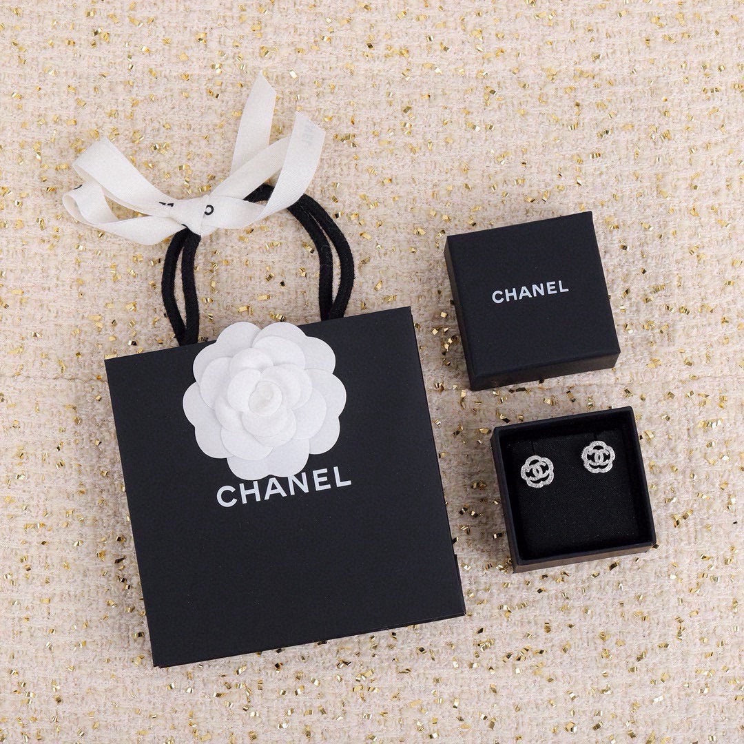 Martin Graham stud earrings in polished metal-tone – front product view