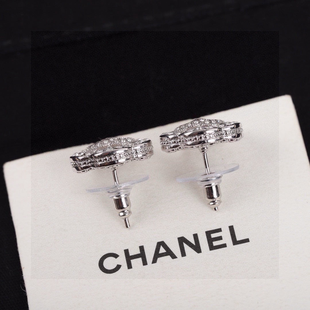 Martin Graham stud earrings in polished metal-tone – side detail